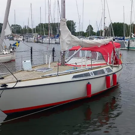 Sailingboat, Next To Ferry